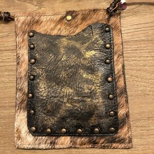 Badass bag cowhide crossbody with metallic distressed leather front pocket